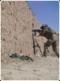 Firing at insurgents during a contact in Kajaki, Helmand Province.jpg